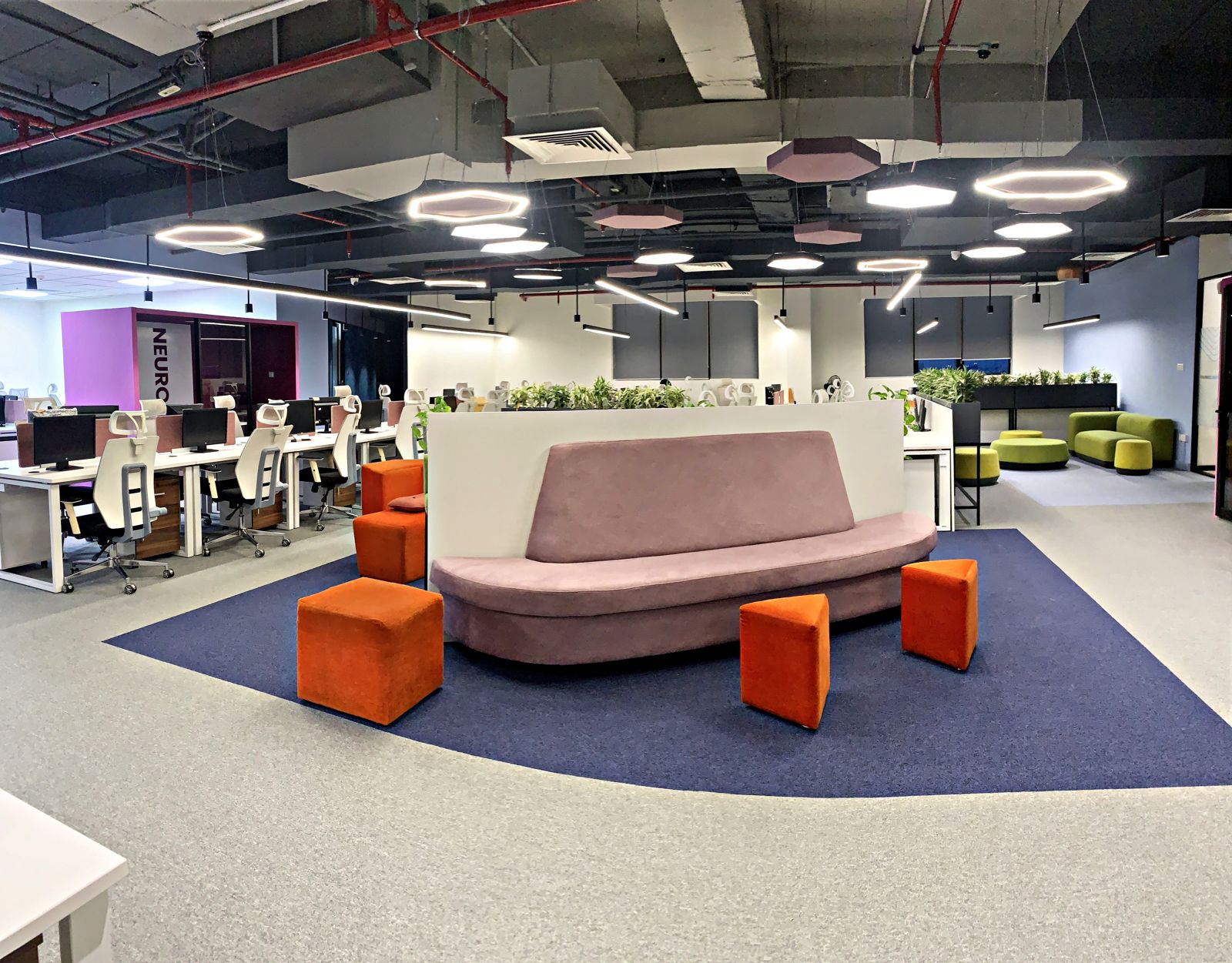 Open plan corporate office with lounge seating and TOLI carpet tiles, Colombo